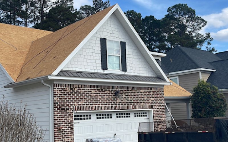 Impact Roofing & Construction